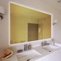 Rectangular mirror with golden tinted glass