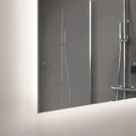 Backlit mirror with antique tint