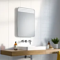 Mirror with rounded corners and triple LED for optimal lighting.
