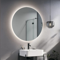 Round mirror with integrated backlighting for ambient lighting