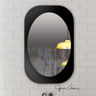 oval mirror in a rectangular frame black finish