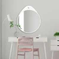 round mirror Oslo white with unique upper deformation