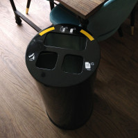 black selective sorting bin with 3 openings on top
