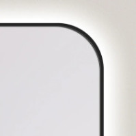 Illuminated designer mirror with rounded frame