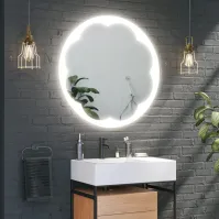 Round mirror with flower decoration and LEDs