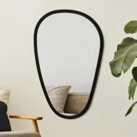 Distorted mirror with black wooden frame
