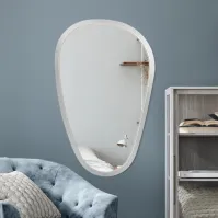 Distorted mirror with white wooden frame
