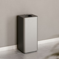 Modern 100-litre grey bin with magnetic waste symbol, side view